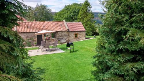 Ann's Cottage And The Old Smithy